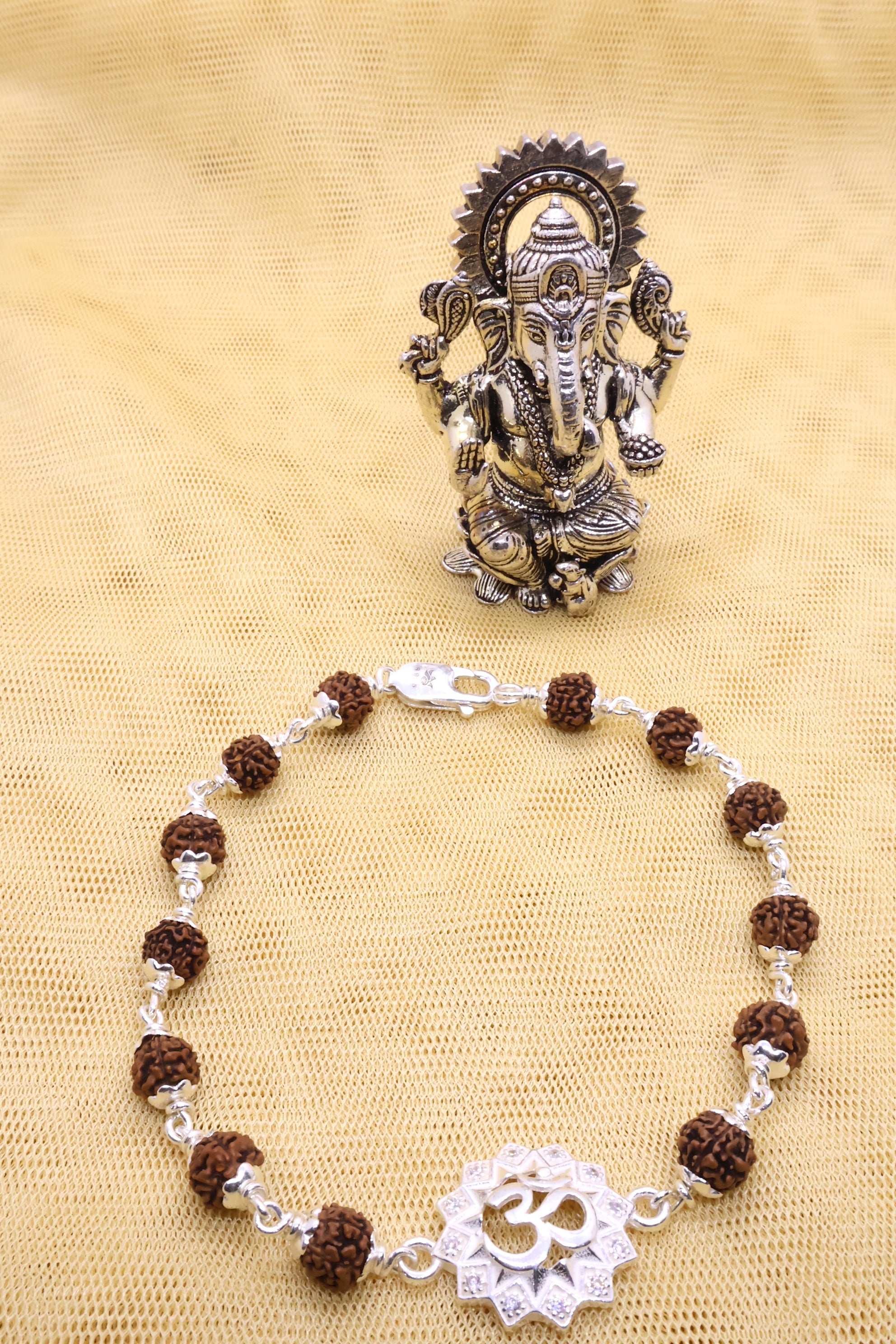 Rudraksha-OM Silver Bracelet: Sacred Connection