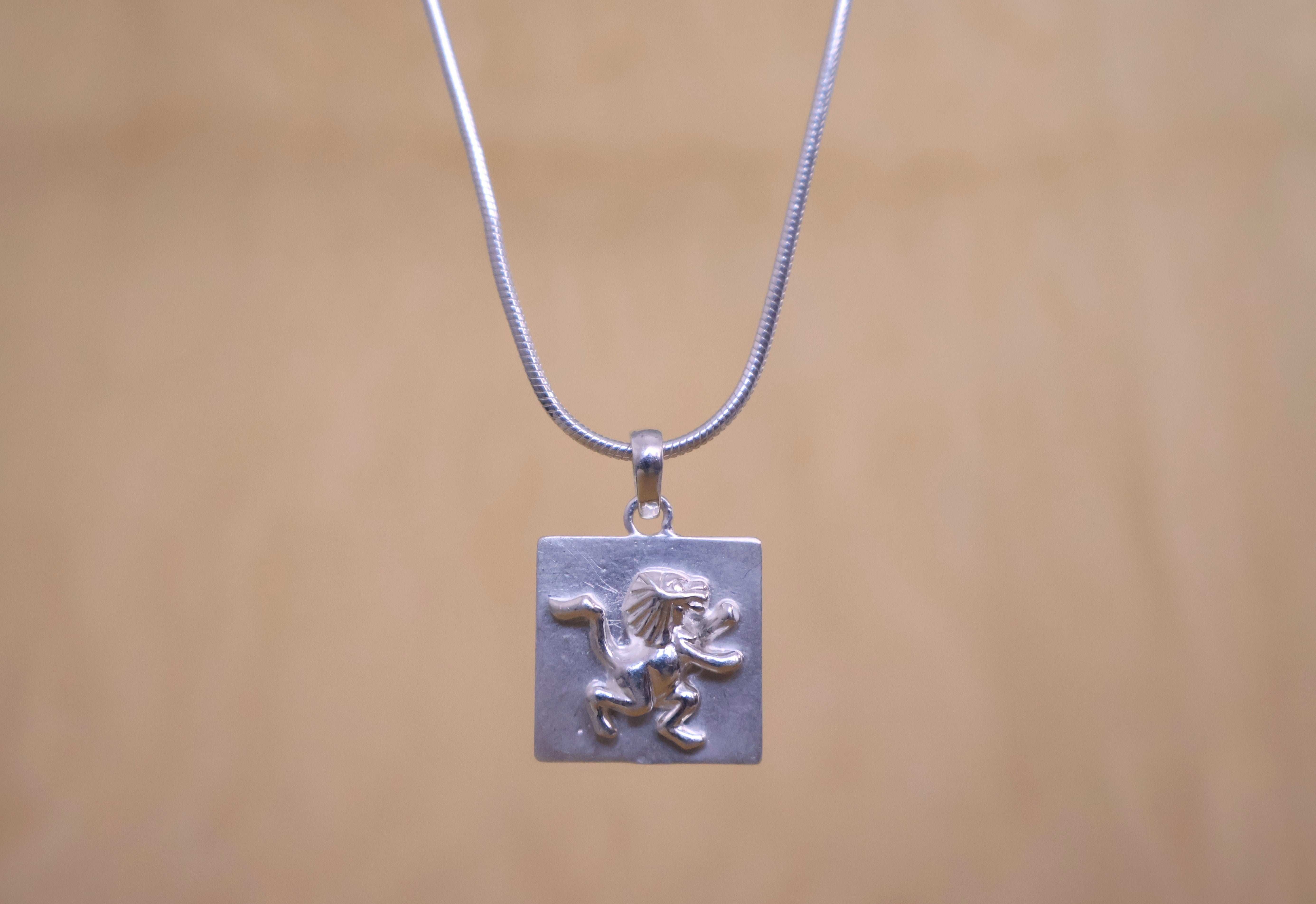 Regal Elegance: Pure Silver Leo Pendant
